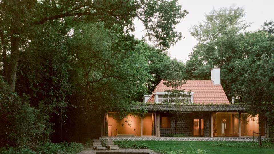 NETHERLANDS  A VILLA DATING BACK TO THE 1950S REDEFINED BY CURVES, BRICKS, AND SYMMETRIES